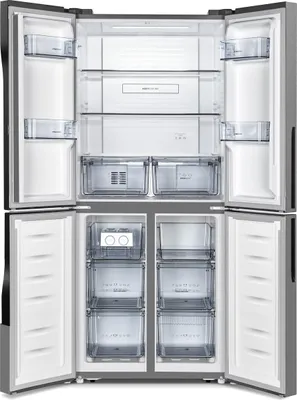 Interior view of an open refrigerator with multiple compartments and drawers.