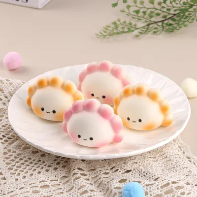 Productafbeelding van Kleine knoedels squishies speelgoed - Set van 4 - Langzaam opstijgende fidget sensorisch speelgoed