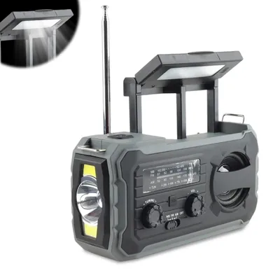 A multi-functional emergency radio with a flashlight and solar panel.