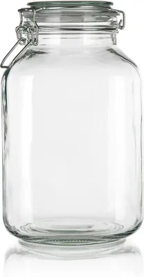 A clear, studio shot of a large, empty glass jar with a clamp lid.