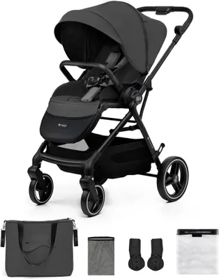 A studio product shot of a stroller and its accessories against a white background.