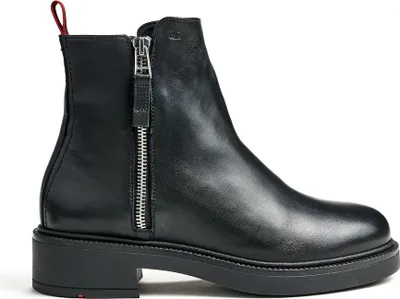 A black leather ankle boot with a side zipper and a red pull tab at the back.