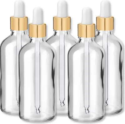 Produktbild von Glasflasche klar 100 ml mit goldener Aluminiumpipette – 5er-Set