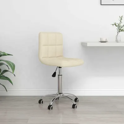 A cream-colored office chair with a chrome base and wheels is shown in a room with a white wall and light gray floor.