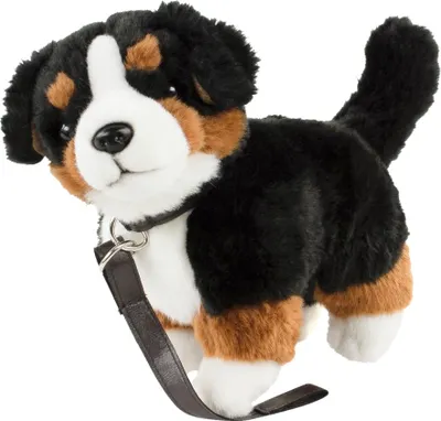 A plush toy dog with a leash.