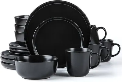 Produktbild von Skugga 472979 Geschirr-Set aus Steingut für 4 Personen, rund, Speiseteller, Beilagenteller, Müslischalen, Tassen, mattes Schwarz