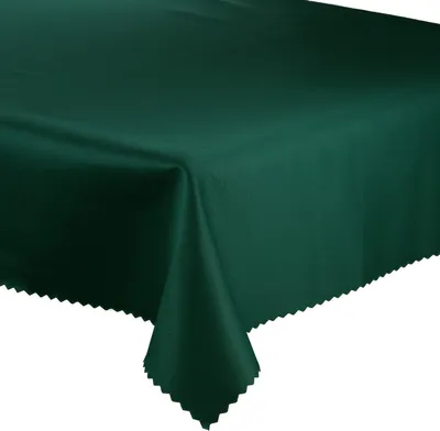 A dark green tablecloth is draped over a table, with one corner hanging down.