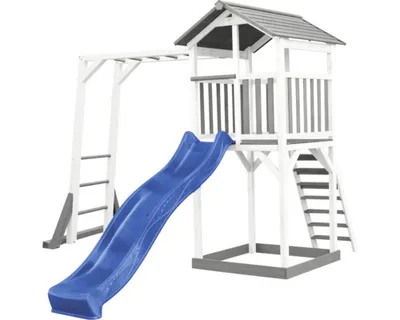 Image de AXI Beach Tower Tour de jeux en bois en blanc & gris | Maison de jeux pour enfants avec toboggan bleu, portique d'escalade et bac à sable | Maison sur pilotis pour le jardin