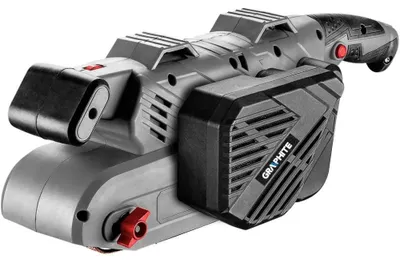 Immagine prodotto di Levigatrice a nastro GRAPHITE 900W, nastro continuo 75x533 mm, avanzamento nastro 200-400 m/min, superficie attiva di levigatura 75 x 135 mm, 3,4 kg, contenitore per la polvere, impugnatura per uso stazionario, 2 morsetti