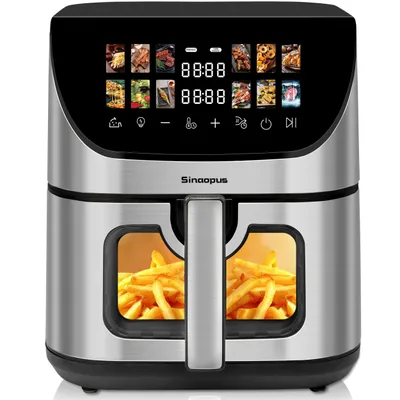 A silver and black air fryer with a digital display and a window showing french fries inside.