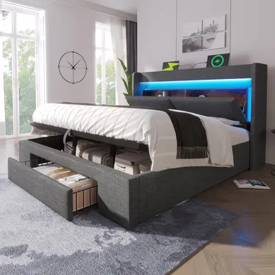 Image de Lit avec sommier tapissé, dimensions 180x200, espace de rangement hydraulique, rangement intégré à la tête de lit, éclairage LED, ports USB et USB-C, lattes en bois, tissu en lin, sans matelas.