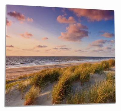 Produktbild von Wallario Herdabdeckplatte aus Glas, Größe 60 x 52 cm 1-teilig, Motiv Abendspaziergang am Strand - Sonnenuntergang über dem Meer
