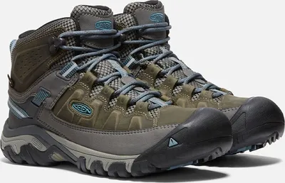 A pair of hiking boots on a white background.