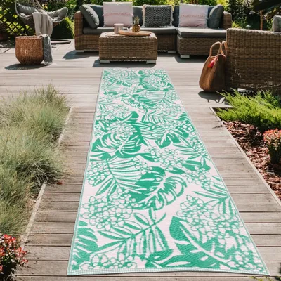 Produktbild von Wetterfester Outdoor-Teppich mit tropischem Flair in petrol Größe - 90 x 300 cm