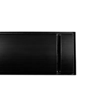 A close-up, straight-on view of a black outdoor heater panel.