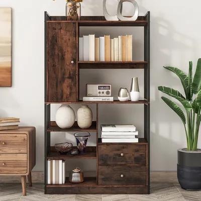 A bookshelf with various decorative items and books on display, placed in a room setting.