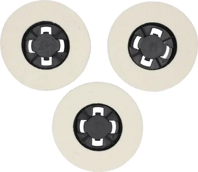 Three cream-colored polishing pads with black centers are arranged in a triangular formation against a white background.