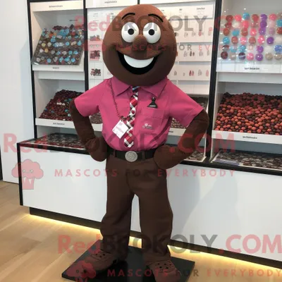 Productafbeelding van Mascottekarakter REDBROKOLY van magenta chocolaatjes gekleed met een overhemd met knopen en armbanden