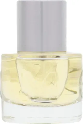 A close-up studio shot of a perfume bottle.