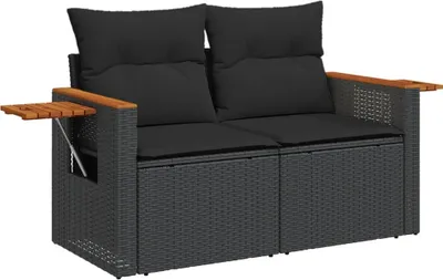 A black poly rattan garden sofa with cushions and wooden armrests, shown against a white background.