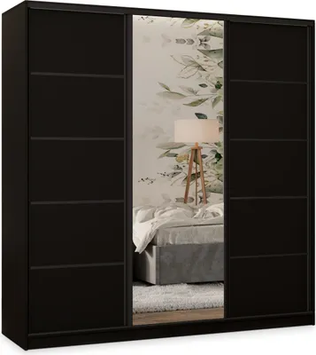 A black sliding door wardrobe with a mirrored center panel reflecting a bedroom scene with a bed and a floor lamp.