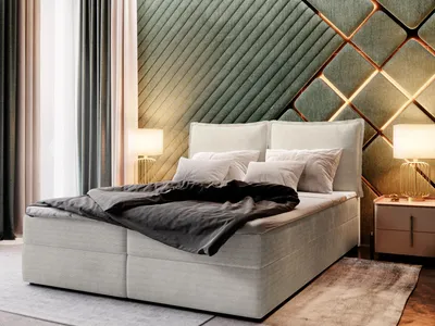 A bedroom scene featuring a bed with a decorative headboard and bedside tables with lamps.