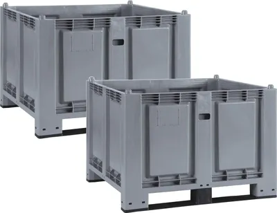 Two grey plastic pallet boxes are shown side-by-side against a white background.