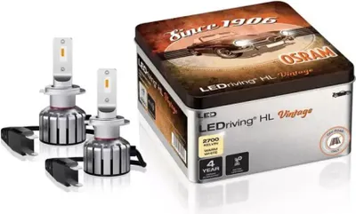A product shot of LED car headlights and their packaging.