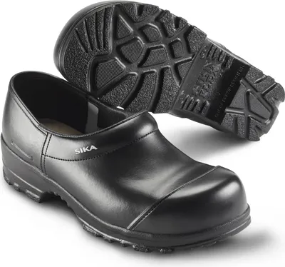 A pair of black Sika clogs are shown against a white background. One clog is in the foreground, and the sole of another clog is visible behind it.