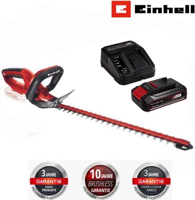 A cordless hedge trimmer with a battery and charger, along with warranty badges.