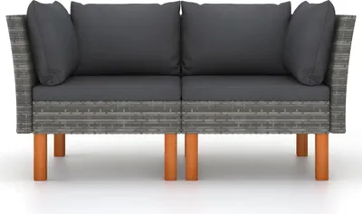 A front view of a two-seater outdoor sofa with dark gray cushions and a woven gray base, supported by four wooden legs.