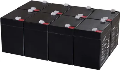 A group of black batteries arranged in a grid.