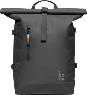 A dark gray rolltop backpack is shown from the front against a plain gray background.