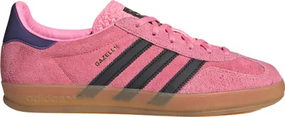A side view of a pink Adidas Gazelle Indoor shoe.