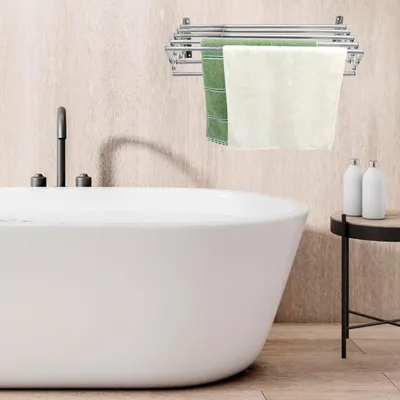 Obrázok produktu pre Skladací vešiak na oblečenie - montáž na stenu - vhodný na balkón a do kúpeľne - 7 tyčí
