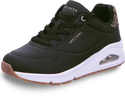 A studio shot of a black Skechers sneaker.