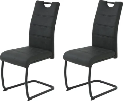 Two black dining chairs with metal frames are shown against a white background.