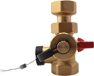 A close-up studio shot of a brass valve with black and red handles against a white background.