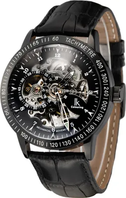 A close-up, studio shot of a mechanical wristwatch with a black leather strap and a skeleton dial.