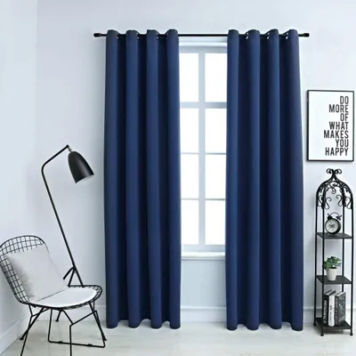 A room interior with blue curtains covering a window, a chair, and a shelf with decorative items.