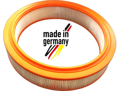 A round air filter with an orange plastic frame and a white pleated filter medium sits on a white background. The words "made in germany" are printed in black text in the center of the filter.
