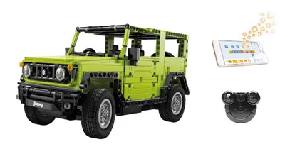 A green toy car, a smartphone displaying a game, and a remote control are displayed against a white background.