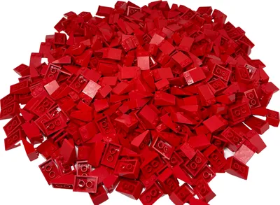 A pile of red LEGO bricks on a white background.
