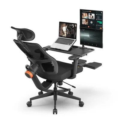 An ergonomic office chair with integrated desk and monitors.