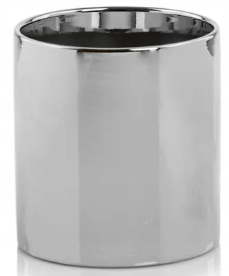 A silver cylindrical object, likely a pot or container, is shown against a white background.