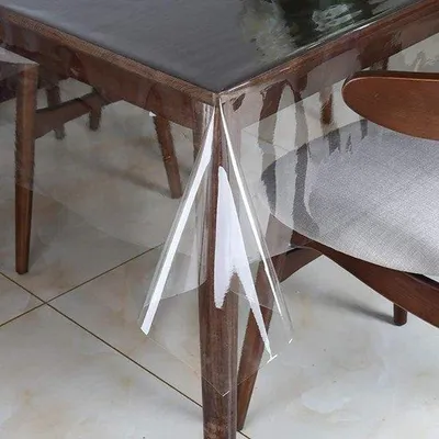 Immagine prodotto di Pellicola trasparente in PVC per tavoli 220 x 140 cm - Impermeabile e lavabile - Fissaggio per esterni - Protezione per tavoli