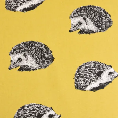 Produktbild von Dekostoff Meterware Baumwolle Digitaldr. Hedgehog gelb schwarz 140cm