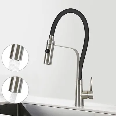 A modern kitchen faucet with a flexible black hose and a pull-out spray head, shown on a countertop next to a sink.