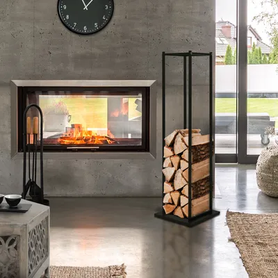 A modern living room with a fireplace and a metal firewood rack.
