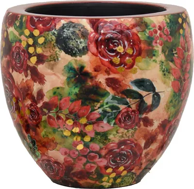 A close-up view of a decorative pot with a floral pattern.